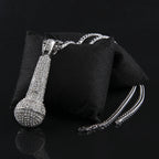 Hip-hop diamond-encrusted microphone necklaces.